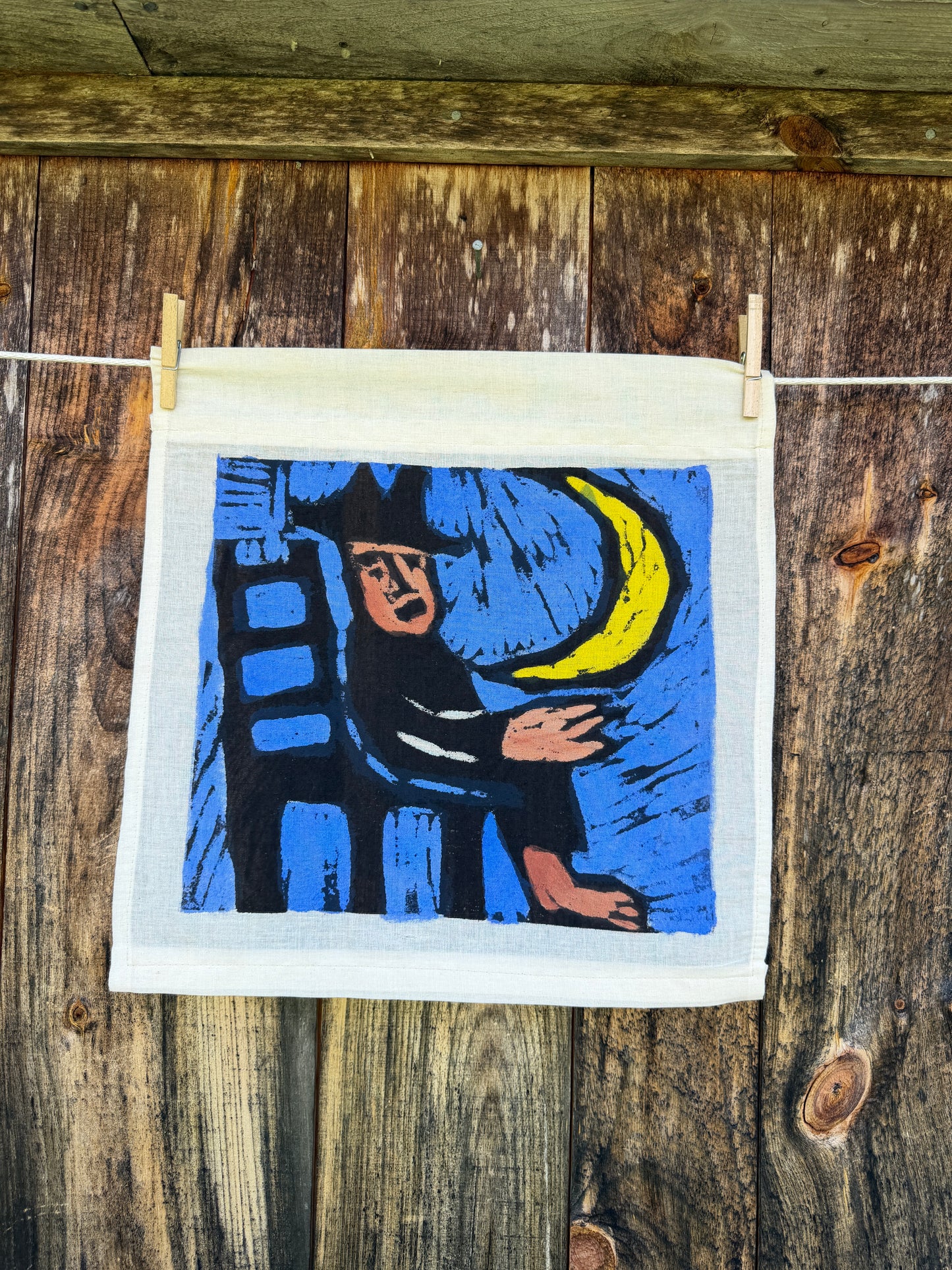 Man in a Chair under the Moon